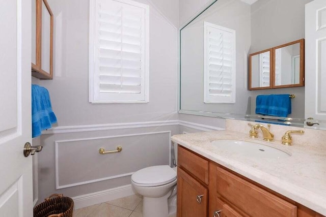 9895 SW Nuova Way, Port Saint Lucie, FL 34986 - bathroom with tile patterned floors, vanity, and toilet