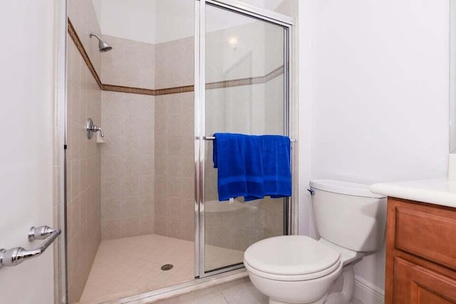 9895 SW Nuova Way, Port Saint Lucie, FL 34986 - bathroom featuring vanity, toilet, and a shower with shower door