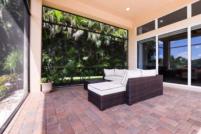 9895 SW Nuova Way, Port Saint Lucie, FL 34986 - view of patio / terrace featuring outdoor lounge area