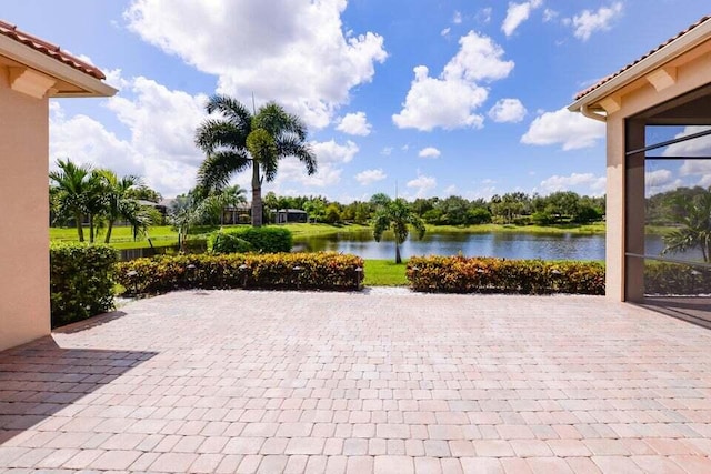 9895 SW Nuova Way, Port Saint Lucie, FL 34986 - view of patio with a water view