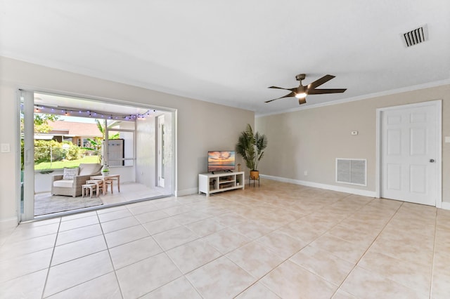 interior space with ceiling fan, light tile patterned flooring, crown molding, and visible vents
