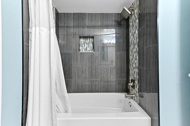 bathroom featuring shower / bath combo