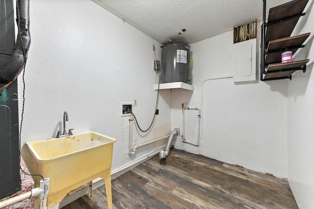 washroom with sink, water heater, electric panel, a textured ceiling, and dark hardwood / wood-style flooring