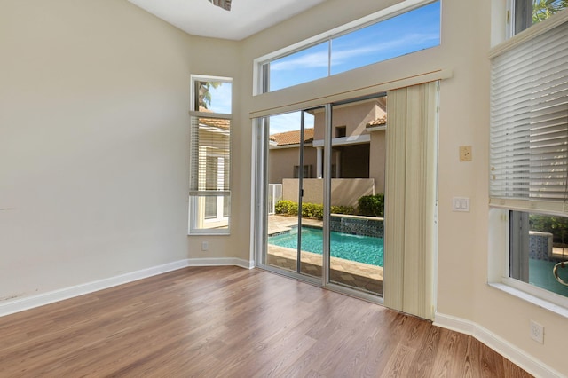 doorway to outside featuring hardwood / wood-style flooring