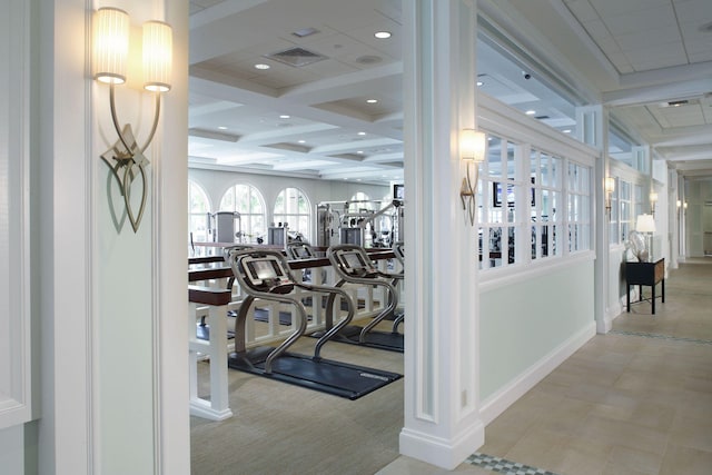 exercise room featuring coffered ceiling, visible vents, and recessed lighting