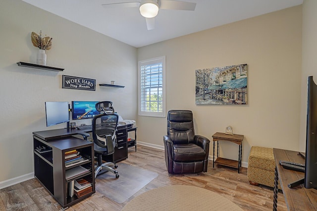 home office with ceiling fan, baseboards, and wood finished floors