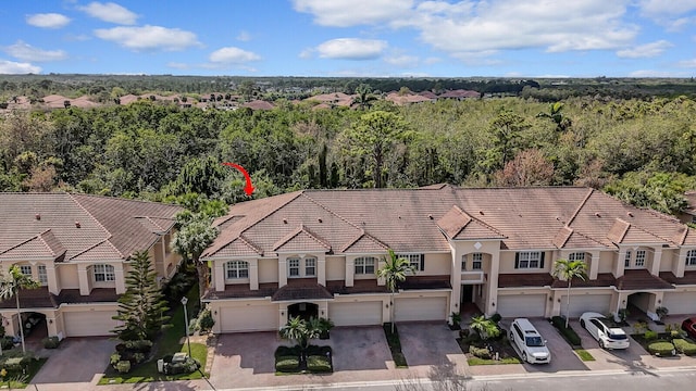 bird's eye view featuring a view of trees