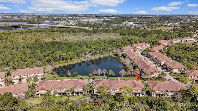 aerial view featuring a residential view and a water view