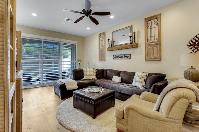 living room with ceiling fan, visible vents, wood finished floors, and recessed lighting