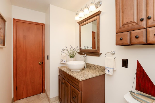 bathroom with vanity and tile patterned floors