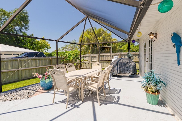 fenced backyard featuring a patio area and outdoor dining space