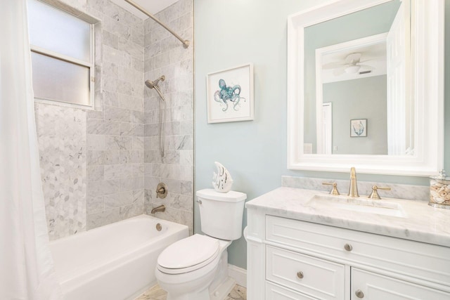 full bathroom with vanity, shower / bath combination with curtain, ceiling fan, and toilet