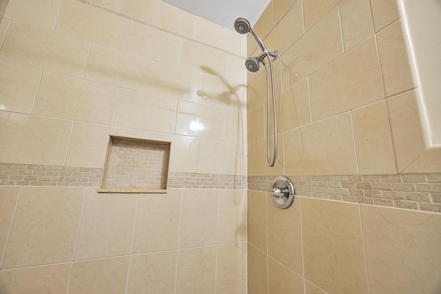 details featuring a tile shower