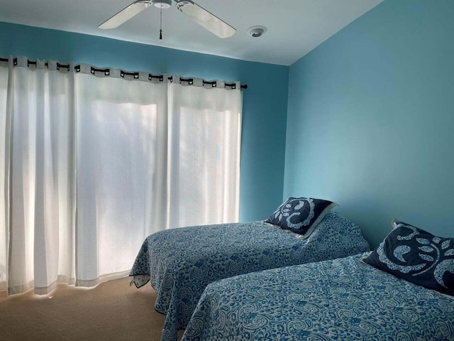 bedroom featuring carpet and ceiling fan