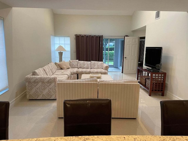 living room featuring light colored carpet