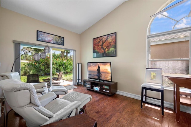 interior space featuring dark hardwood / wood-style floors and vaulted ceiling