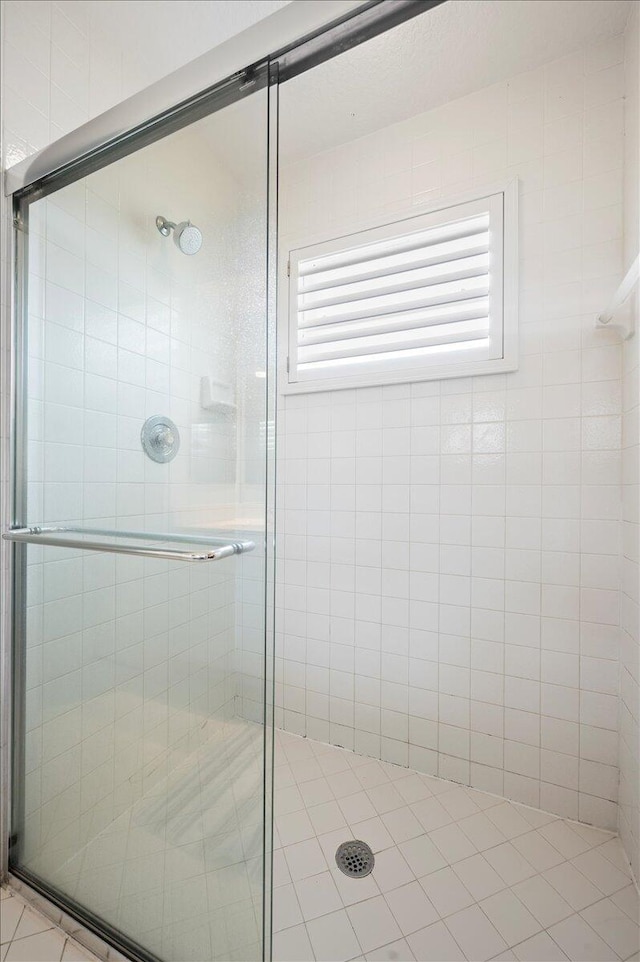 bathroom featuring an enclosed shower