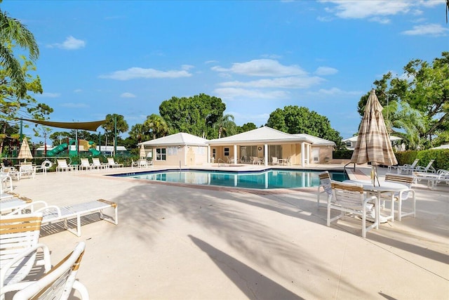 view of swimming pool featuring a patio