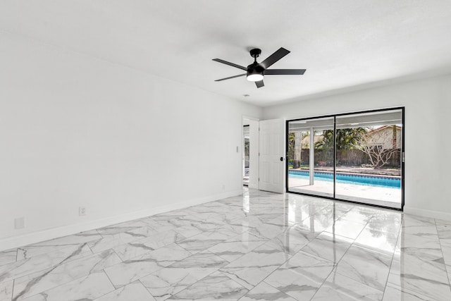 spare room featuring ceiling fan