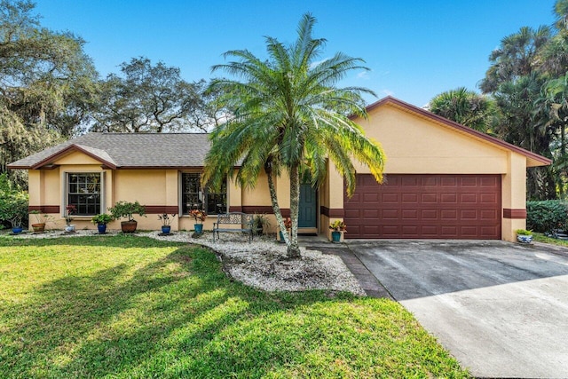 ranch-style house featuring a garage and a front lawn