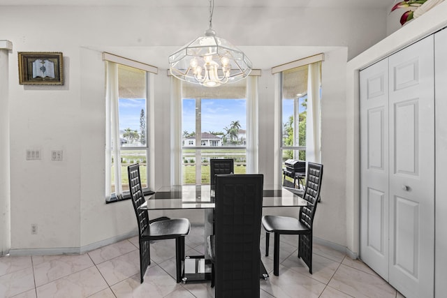 dining area with a chandelier