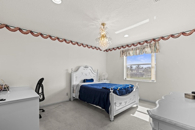 carpeted bedroom featuring a textured ceiling