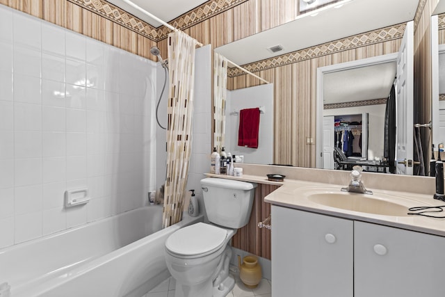 full bathroom with vanity, toilet, and shower / bath combo with shower curtain