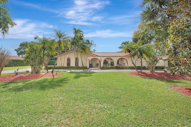 view of front of house with a front yard