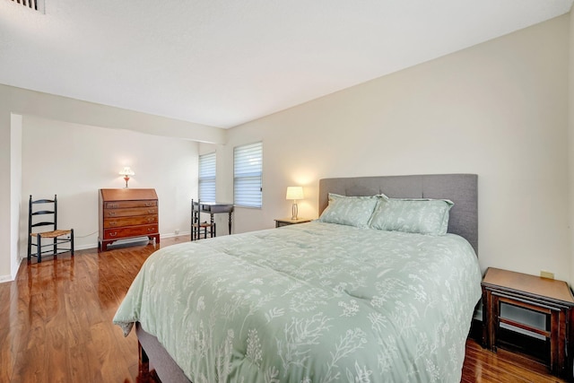 bedroom featuring hardwood / wood-style flooring