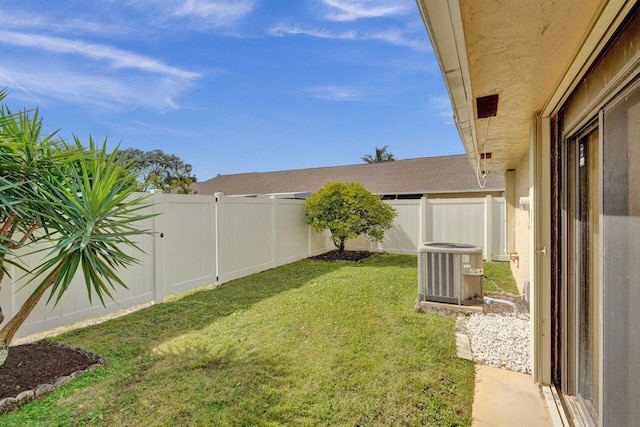 view of yard featuring central AC unit