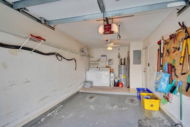 garage featuring a garage door opener, washer and clothes dryer, electric water heater, and electric panel