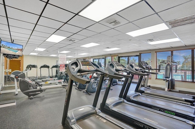 workout area with a drop ceiling