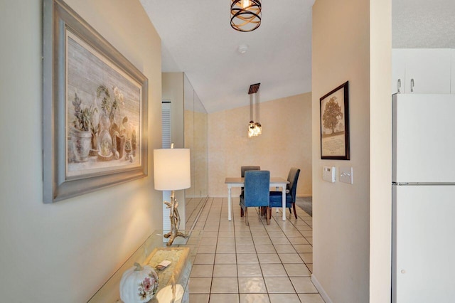 hallway with light tile patterned floors