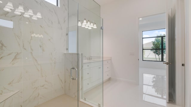 bathroom featuring vanity and walk in shower