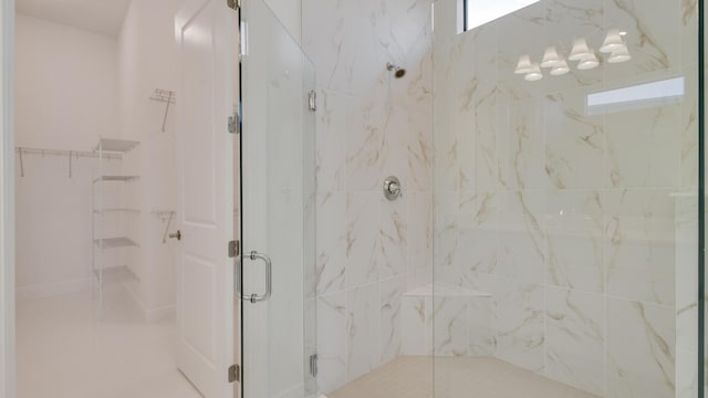 bathroom featuring an enclosed shower