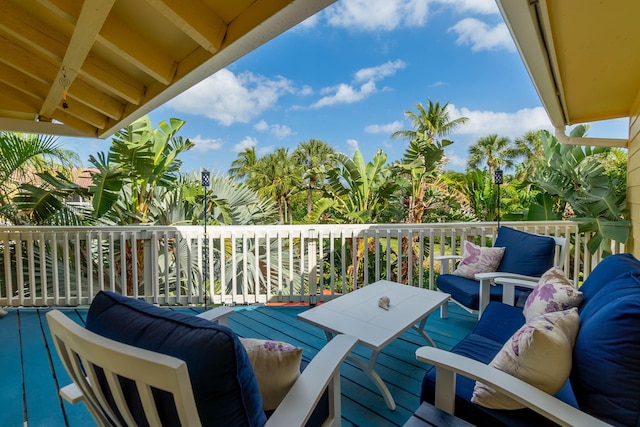 wooden deck with an outdoor hangout area