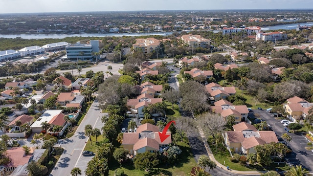 drone / aerial view featuring a water view