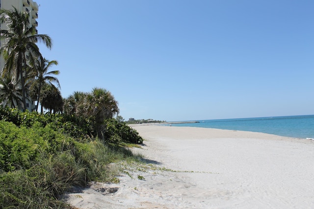 property view of water with a beach view