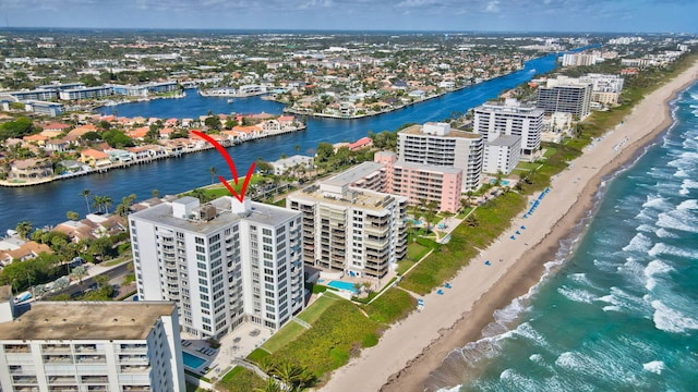 aerial view with a view of the beach and a water view