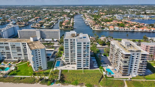 birds eye view of property featuring a water view