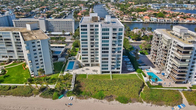 birds eye view of property featuring a water view