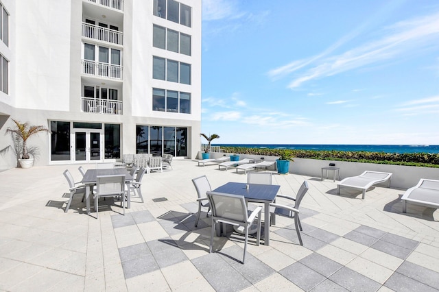 view of patio / terrace featuring a water view