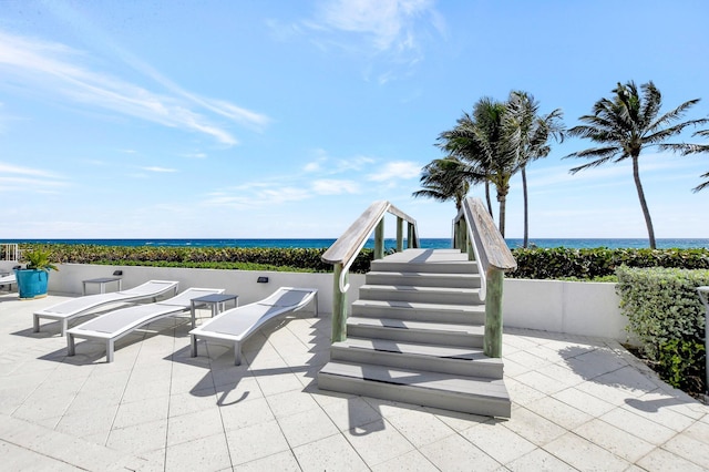 view of patio / terrace with a water view