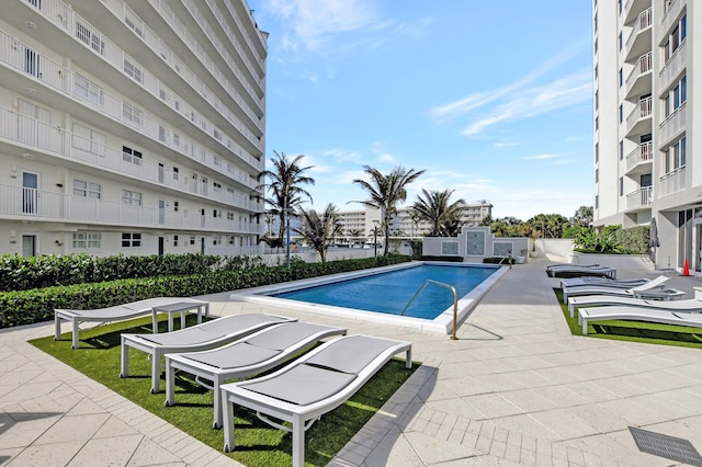 view of pool featuring a patio