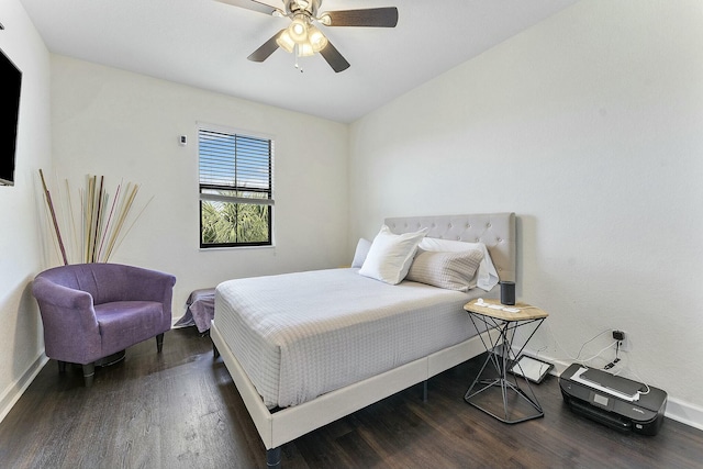 bedroom featuring dark hardwood / wood-style floors and ceiling fan