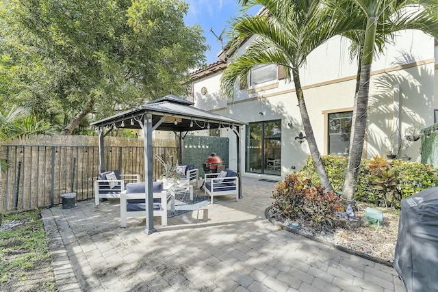 view of patio / terrace featuring a gazebo and an outdoor living space