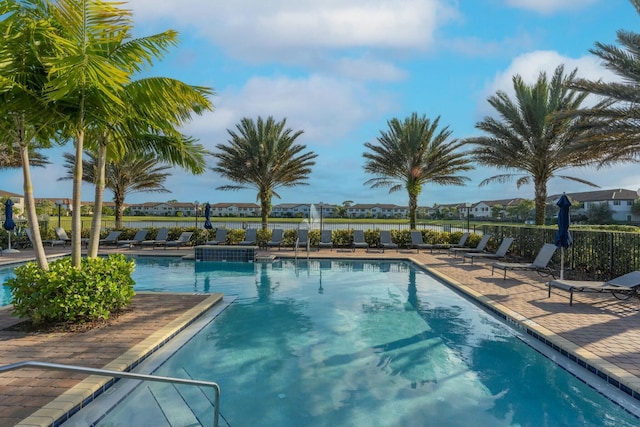 view of swimming pool with a patio