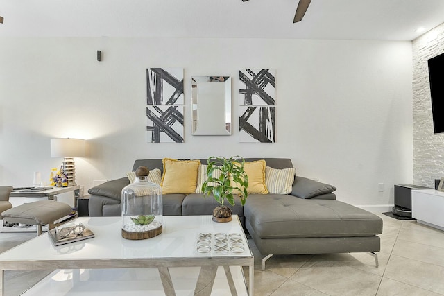 tiled living room featuring ceiling fan