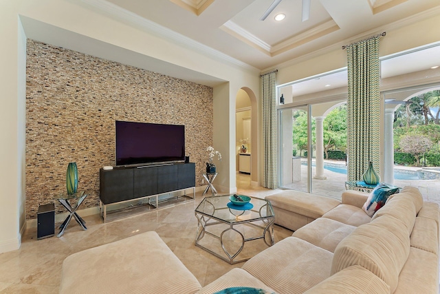 living room with coffered ceiling and crown molding