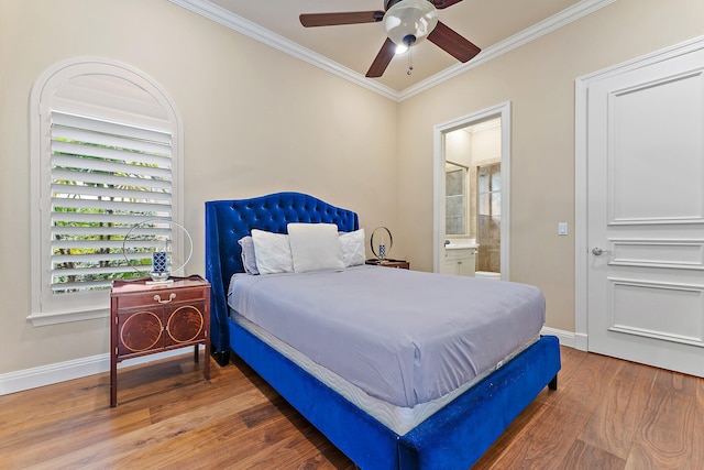 bedroom featuring connected bathroom, crown molding, ceiling fan, and hardwood / wood-style flooring